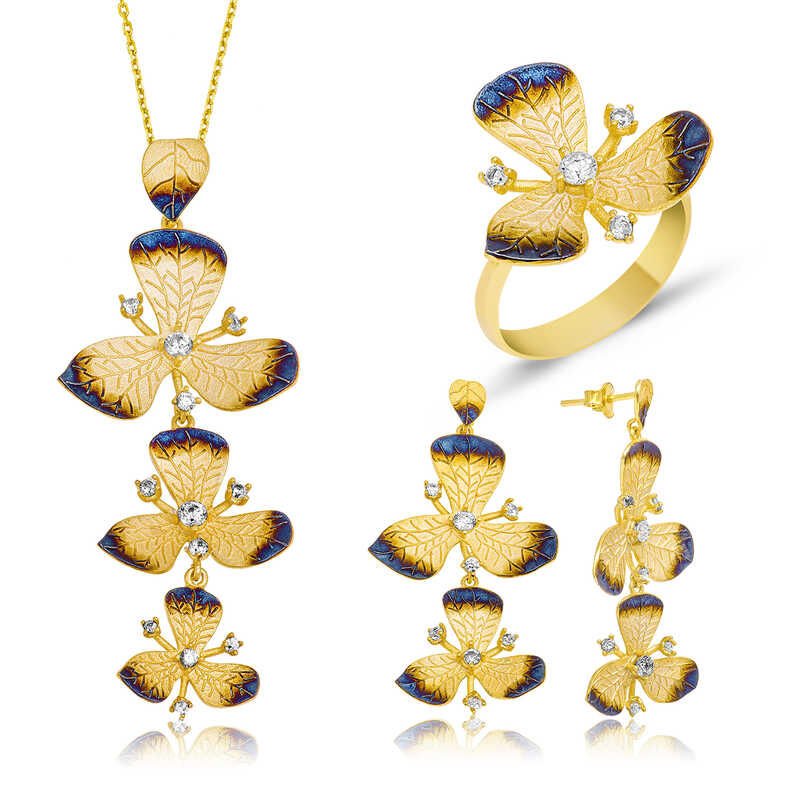 Conjunto de mujer con flores amarillas plateadas