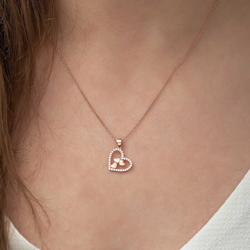 Collar de tres corazones con corazón de rosa de plata