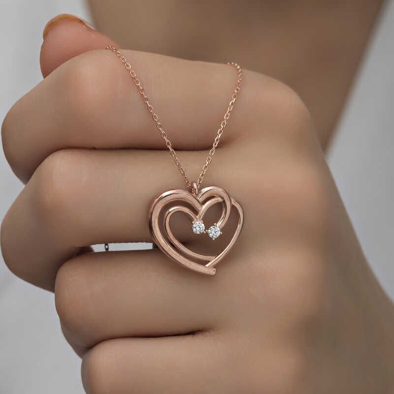 Collar de corazones unidos de plata rosa para mujer