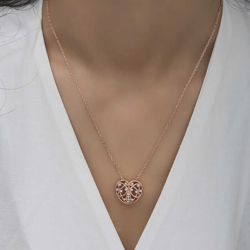 Collar de mujer con corazón abovedado y rosa de plata