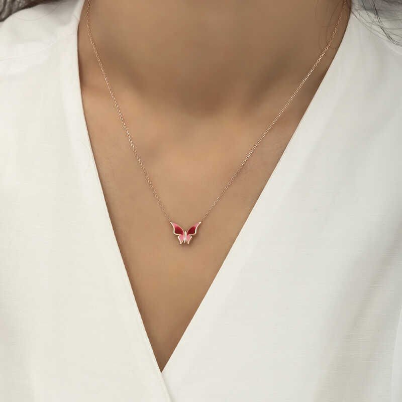 Collar minimalista de mariposa rosa de plata para mujer