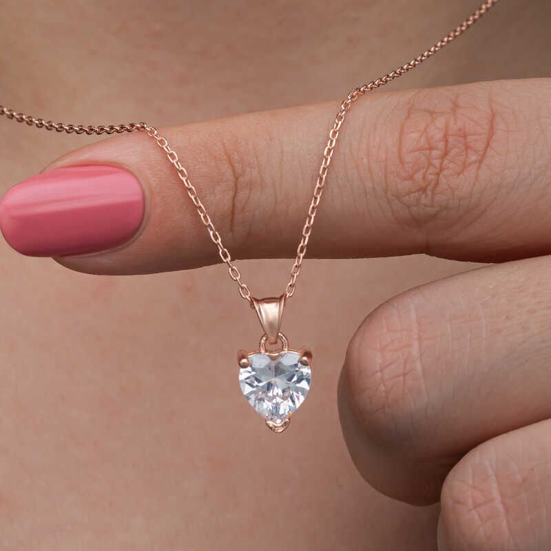 Collar de mujer con corazón de piedra blanca y rosa de plata